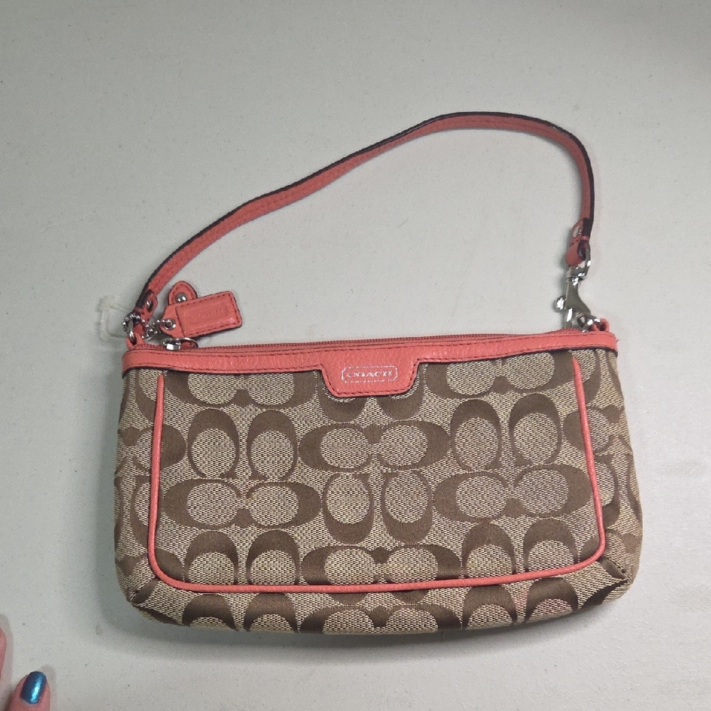 Coach Signature Canvas Wristlet in Tan and Coral
